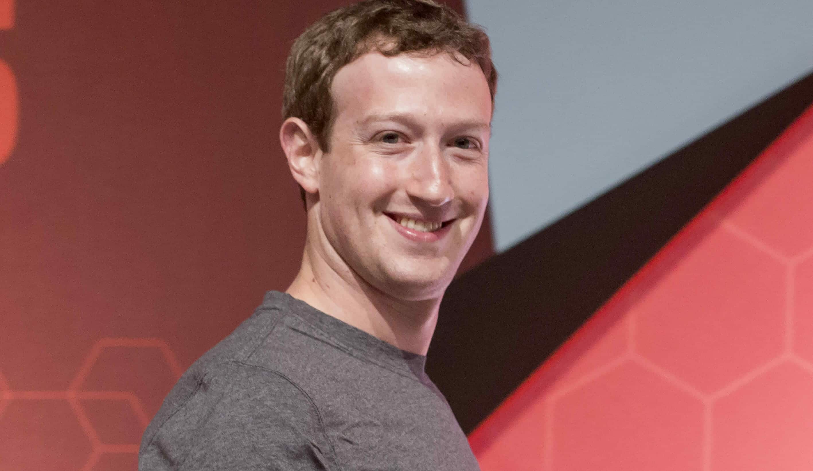 Mark Zuckerberg, looking happy