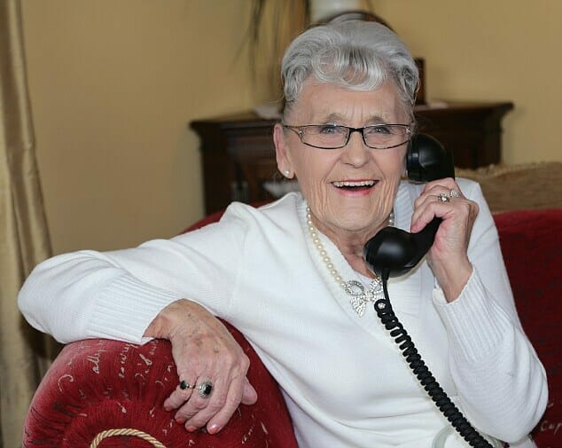 Granny using a home phone.