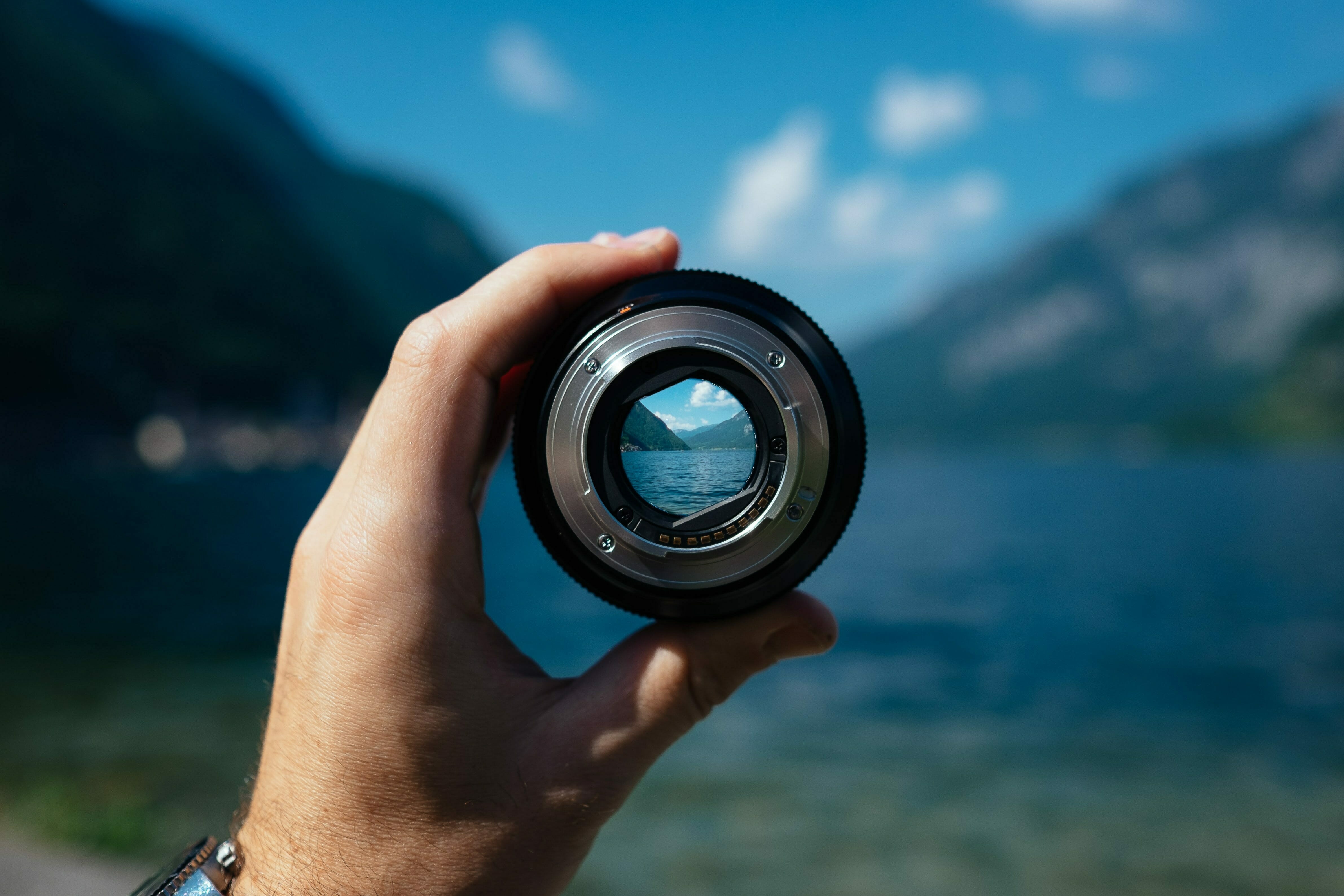 hand holding magnifying scope